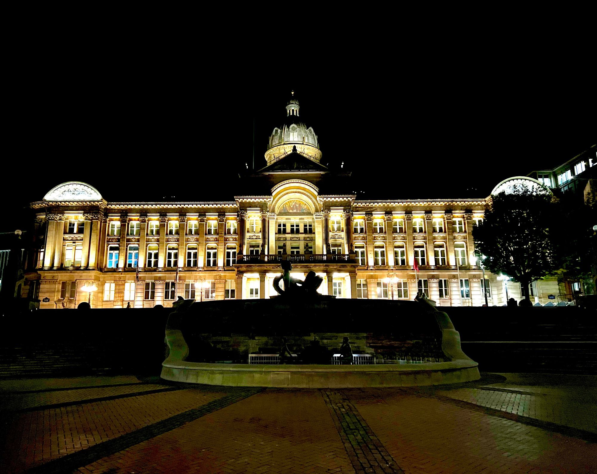 The Birmingham Museum & Art Gallery illuminated at night.