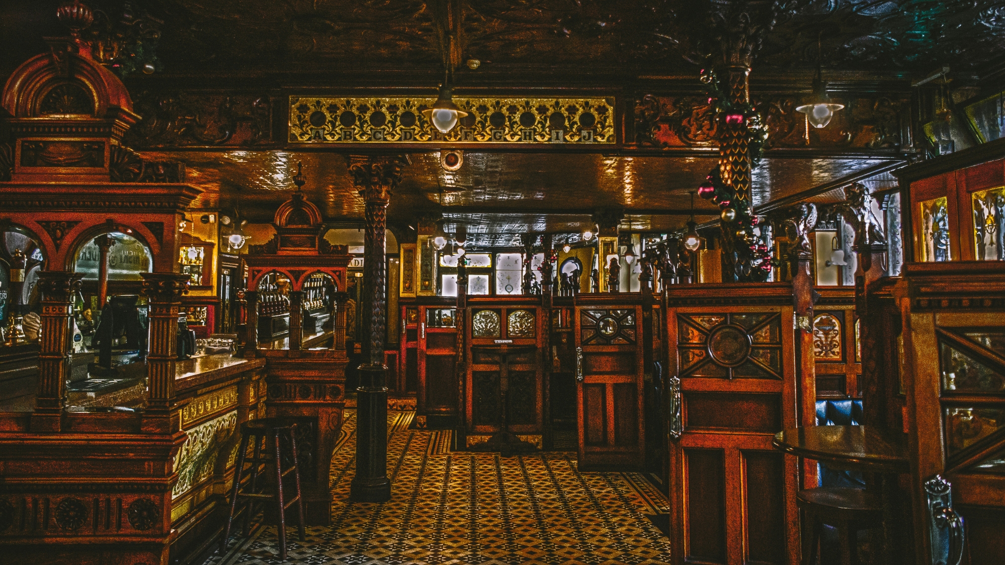 The inside decor of a traditional British pub.