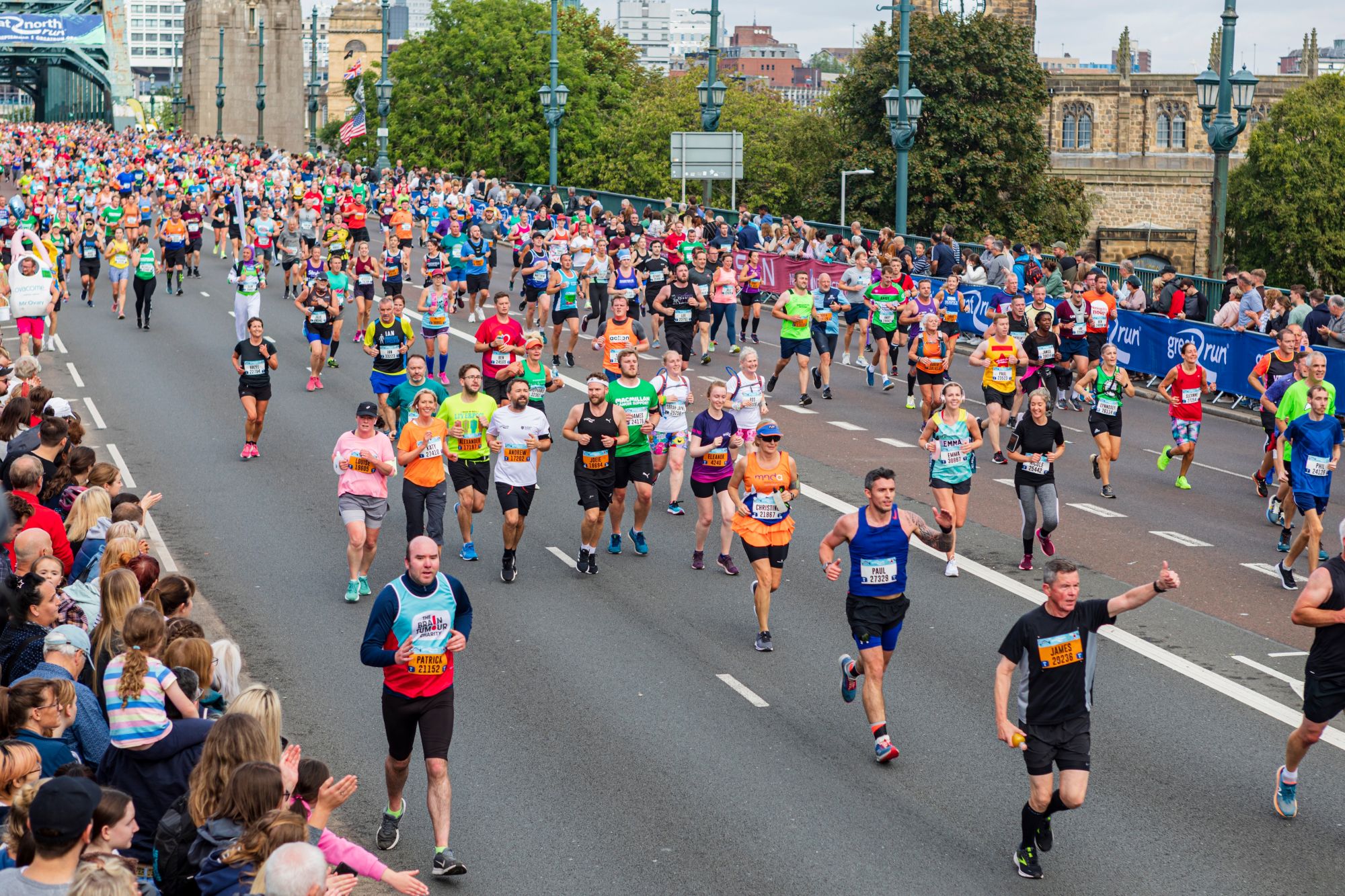 A group of people running the Great North Run in Newcastle.