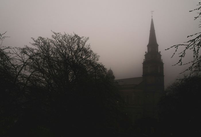 A steeple in Edinburgh covered in mist