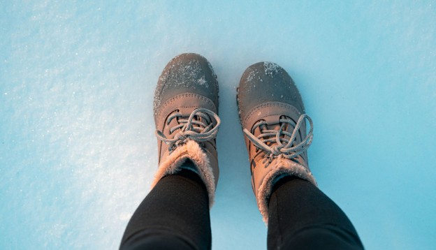 Pair of boots in the snow