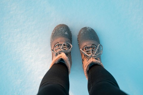 Pair of boots in the snow