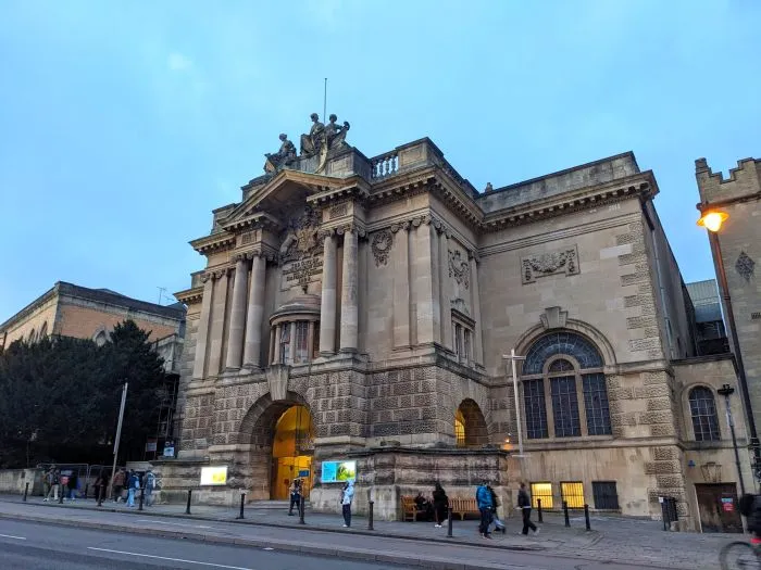 The exterior of Bristol Museum and Art Gallery on a bright evening.