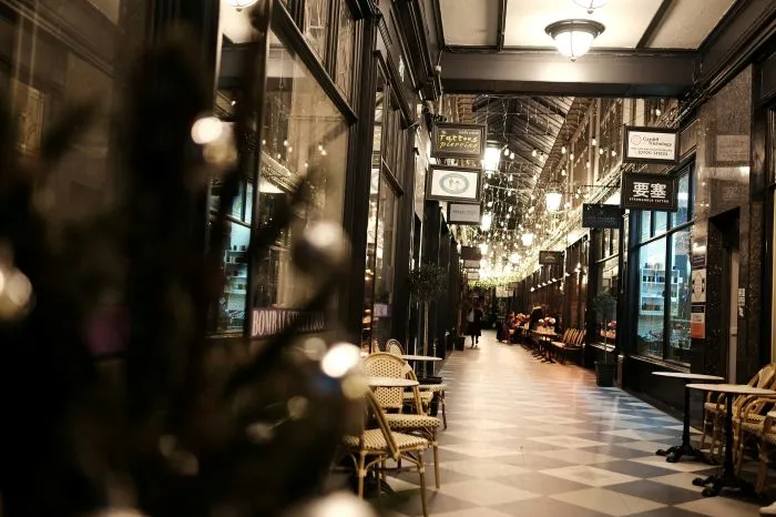 Cardiff Arcades with shops and hanging fairy lights.