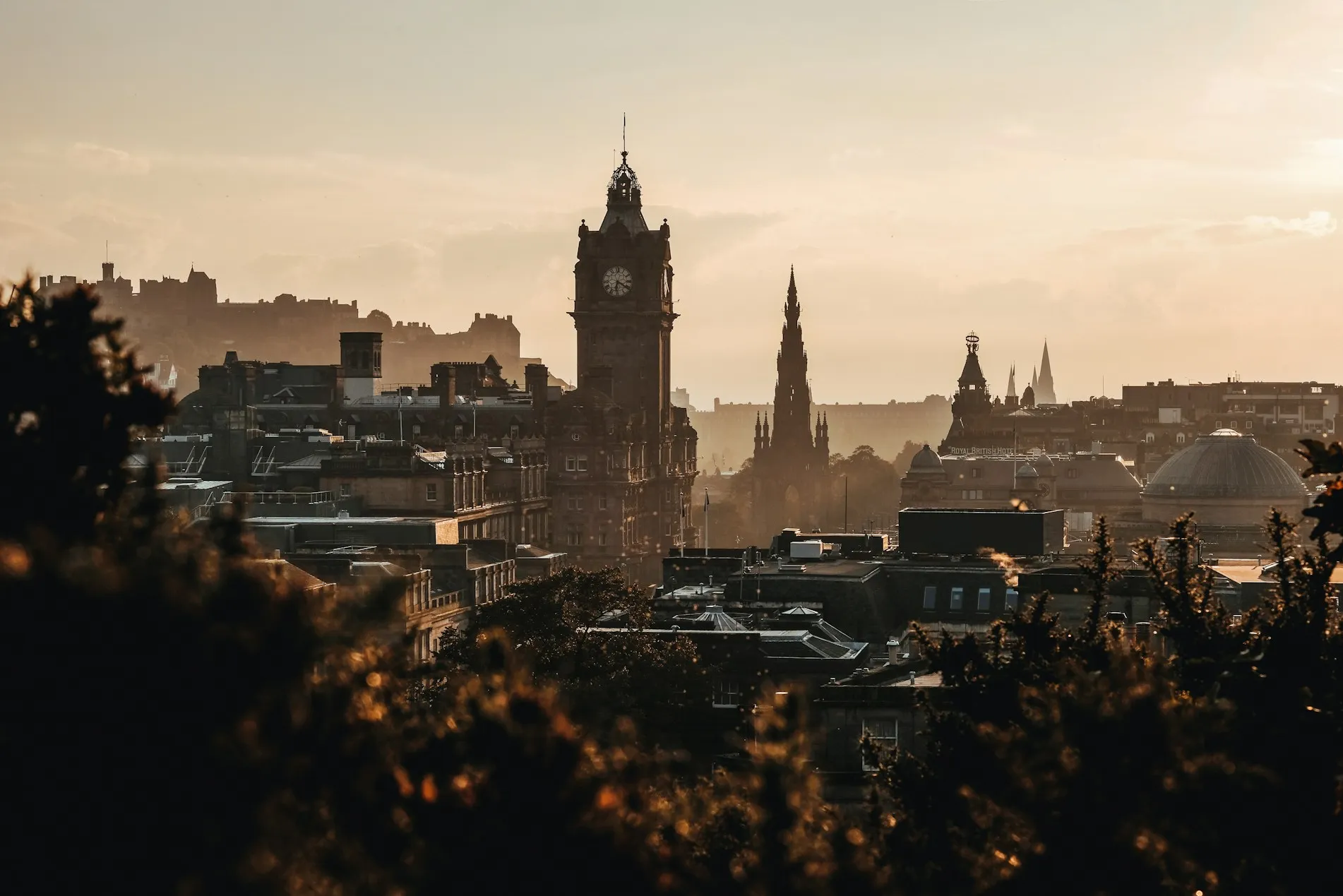 Edinburgh during autumn with the Balmoral Hotel clock tower in the distance.