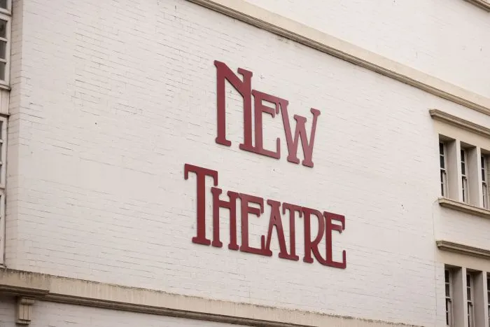 The red ‘New Theatre’ sign in Cardiff.