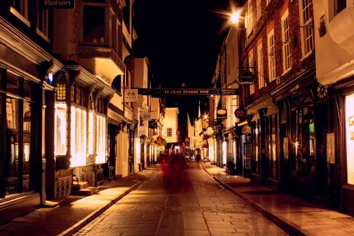 The famous Stonegate street in York at night.
