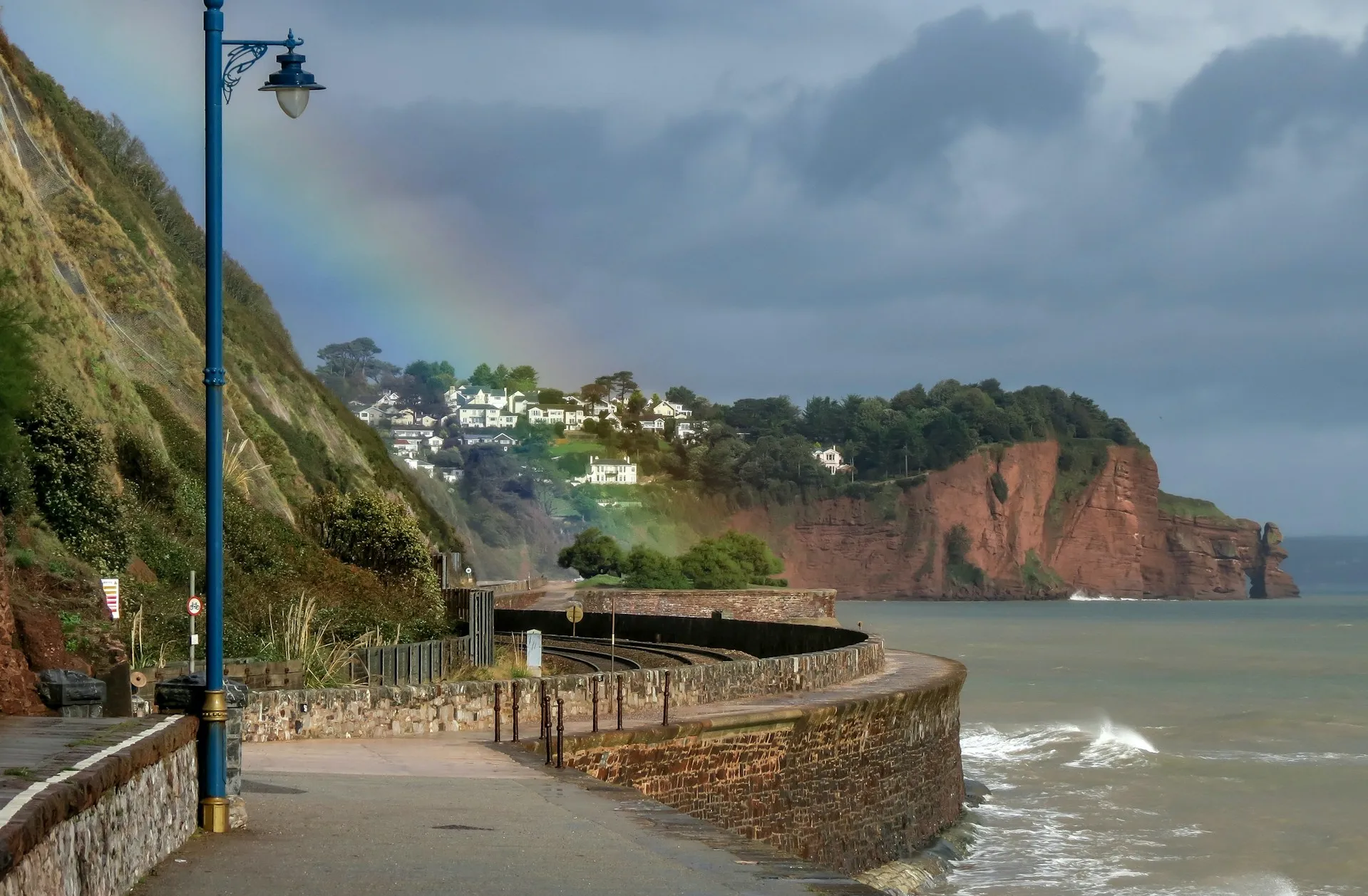 A rainbow over the Teignmouth coastal footpath.